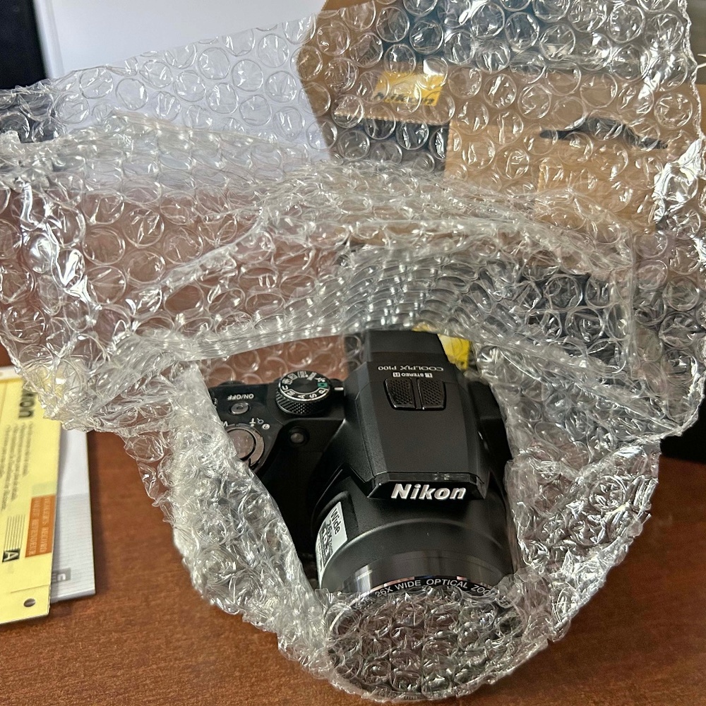 NIKON COOLPIX P100 DIGITAL CAMERA, 10.3MP, 26X ZOOM, SD CARD READER, NEVER OPENE
